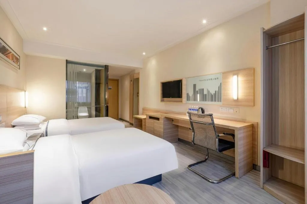 Bed in City Comfort Inn Huanggang Baota Avenue