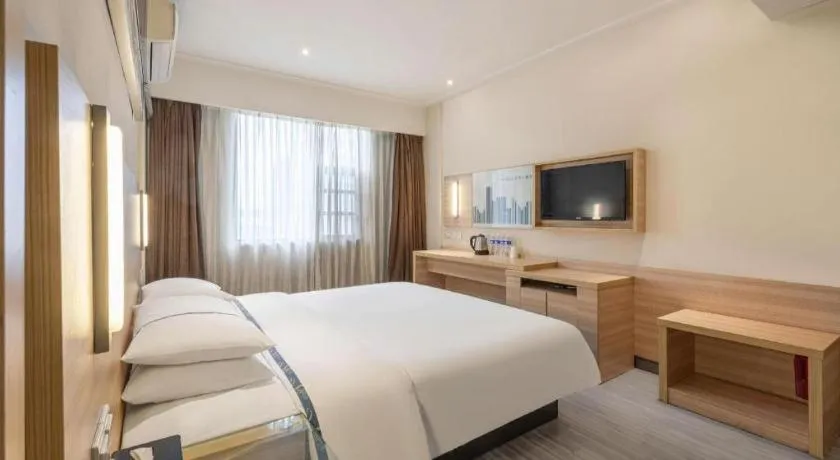 Bed in City Comfort Inn Huanggang Baota Avenue