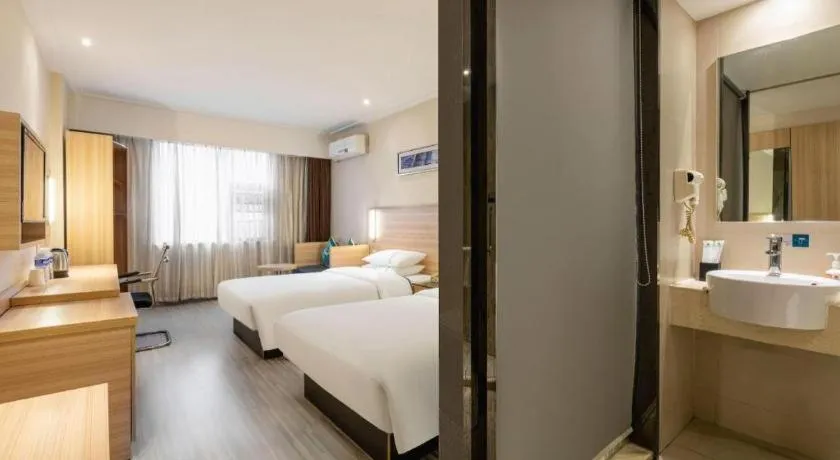 Bed in City Comfort Inn Huanggang Baota Avenue