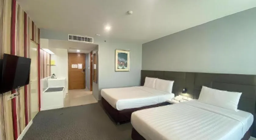 Bed in Thamrongin Hotel