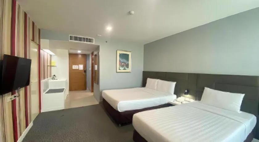 Bed in Thamrongin Hotel