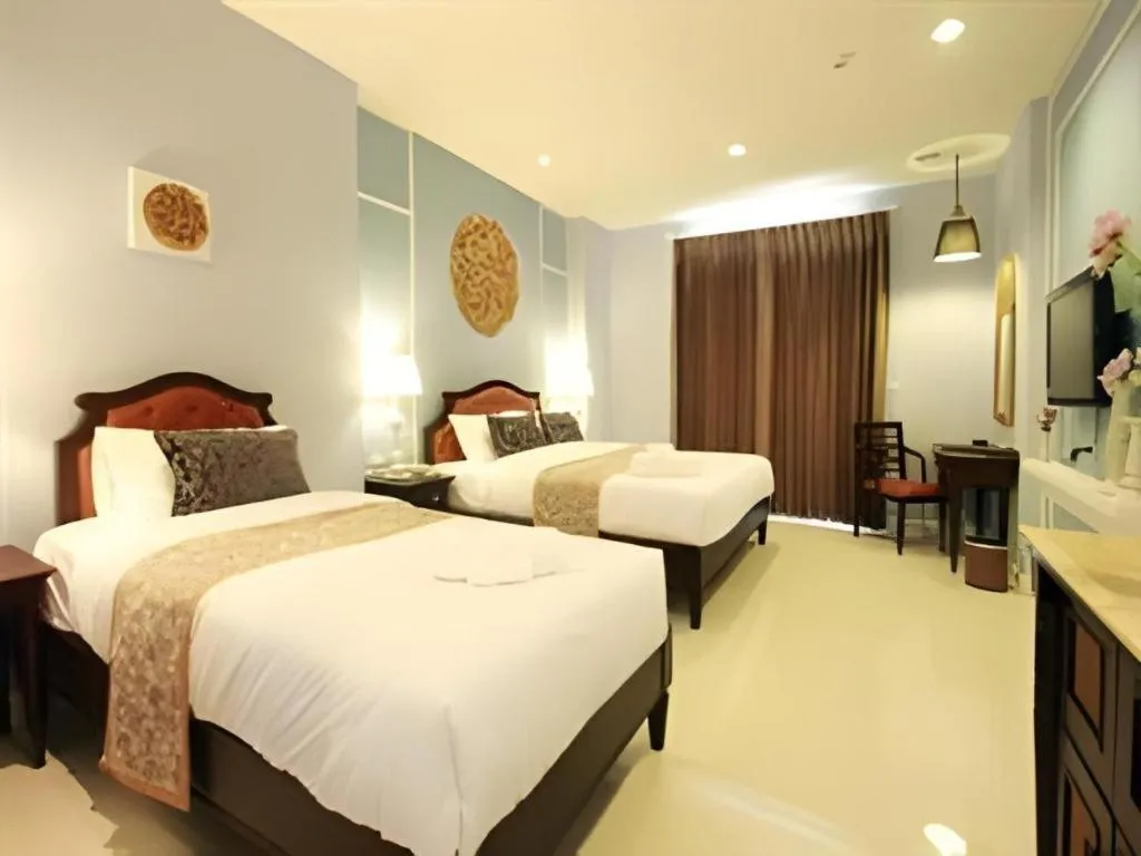 Bed in Khamthana the Colonial Hotel Chiangrai