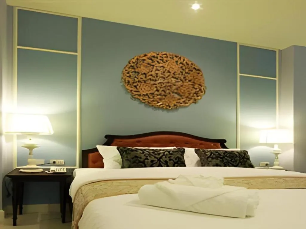 Bed in Khamthana the Colonial Hotel Chiangrai