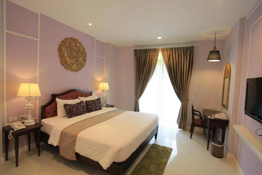 Bed in Khamthana the Colonial Hotel Chiangrai