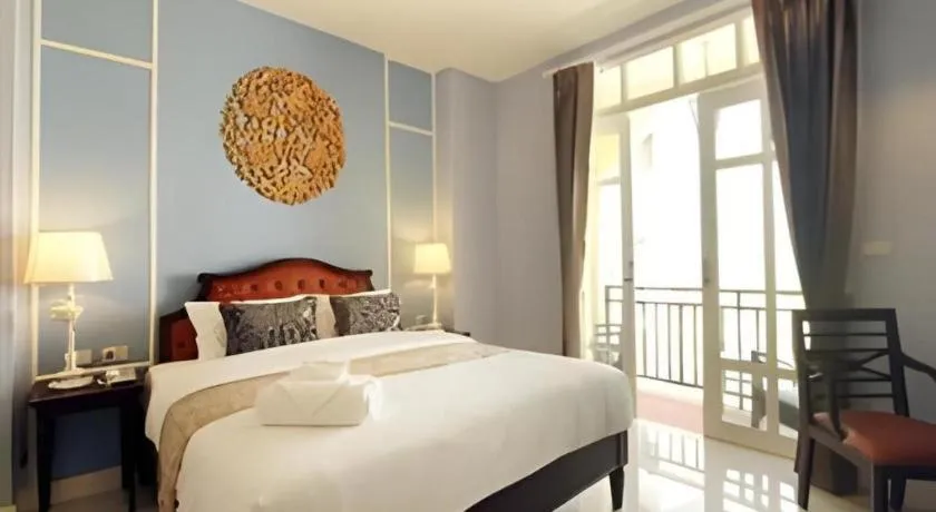 Bed in Khamthana the Colonial Hotel Chiangrai