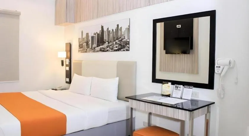 Bed in Majestic Hotel Manila - Formerly Octagon Mansion Hotel Manila