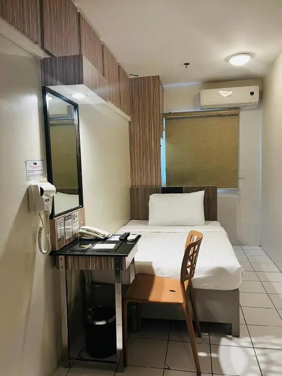 Bed in Majestic Hotel Manila - Formerly Octagon Mansion Hotel Manila