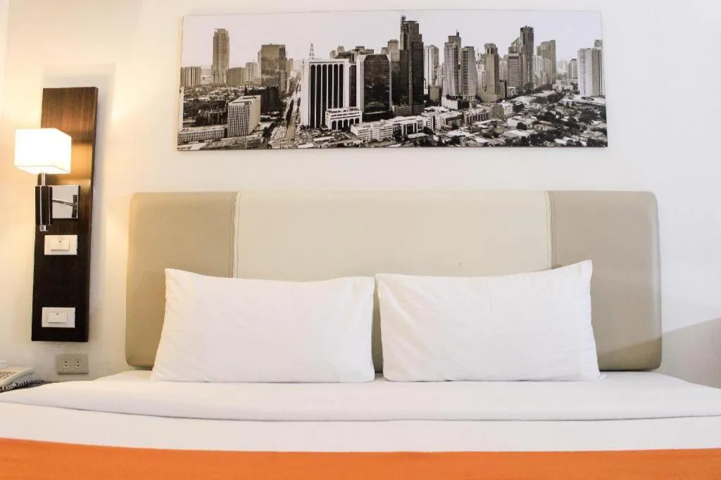 Bed in Majestic Hotel Manila - Formerly Octagon Mansion Hotel Manila