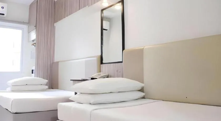 Bed in Majestic Hotel Manila - Formerly Octagon Mansion Hotel Manila