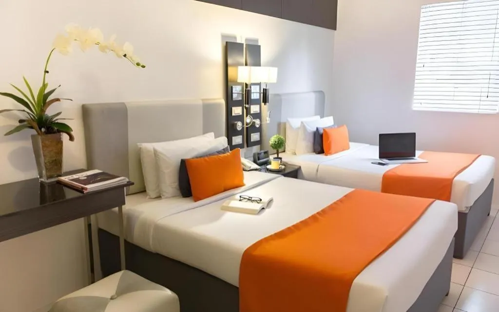 Bed in Majestic Hotel Manila - Formerly Octagon Mansion Hotel Manila