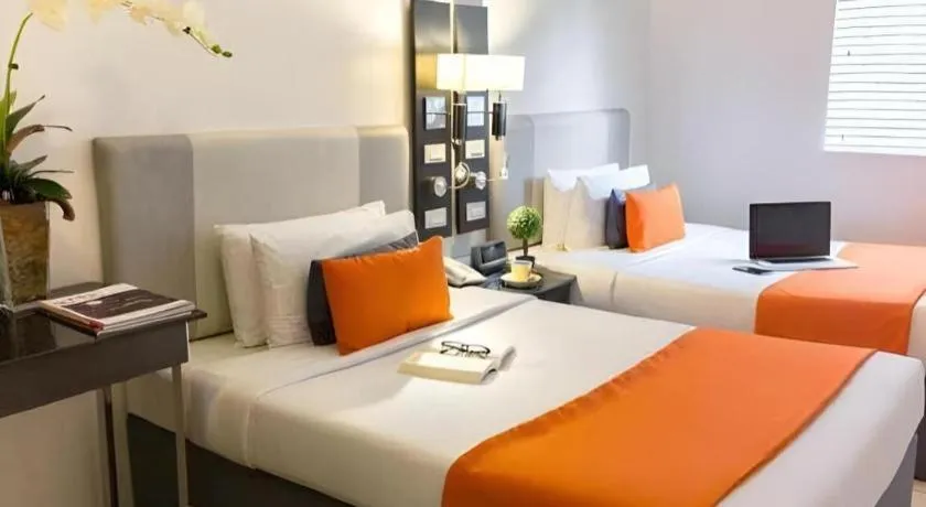 Bed in Majestic Hotel Manila - Formerly Octagon Mansion Hotel Manila