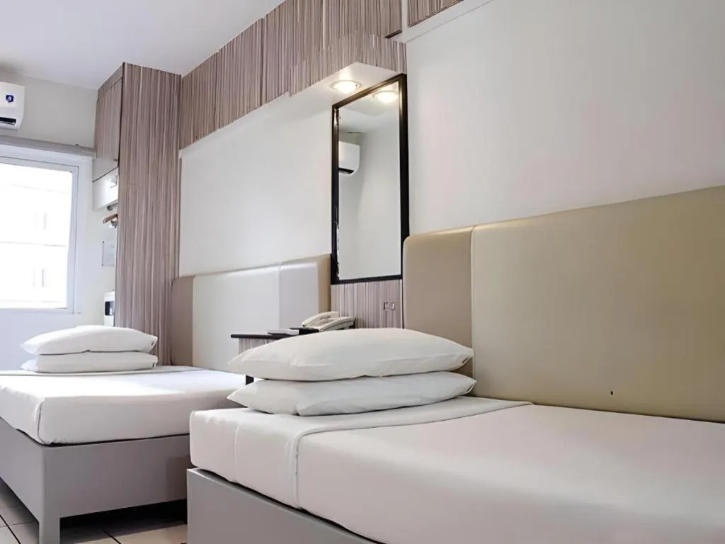 Bed in Majestic Hotel Manila - Formerly Octagon Mansion Hotel Manila