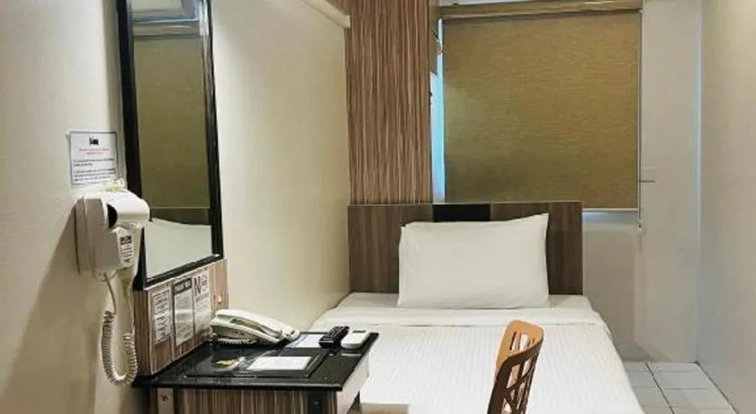 Bed in Majestic Hotel Manila - Formerly Octagon Mansion Hotel Manila