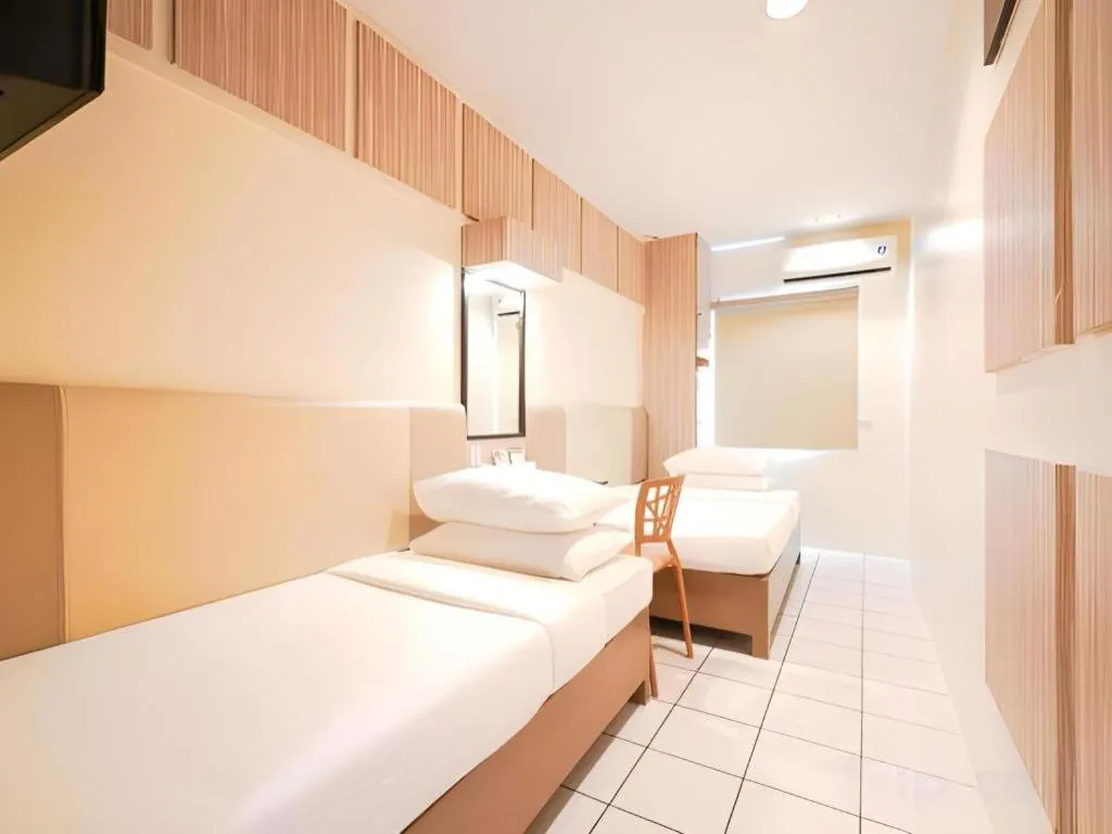 Bed in Majestic Hotel Manila - Formerly Octagon Mansion Hotel Manila