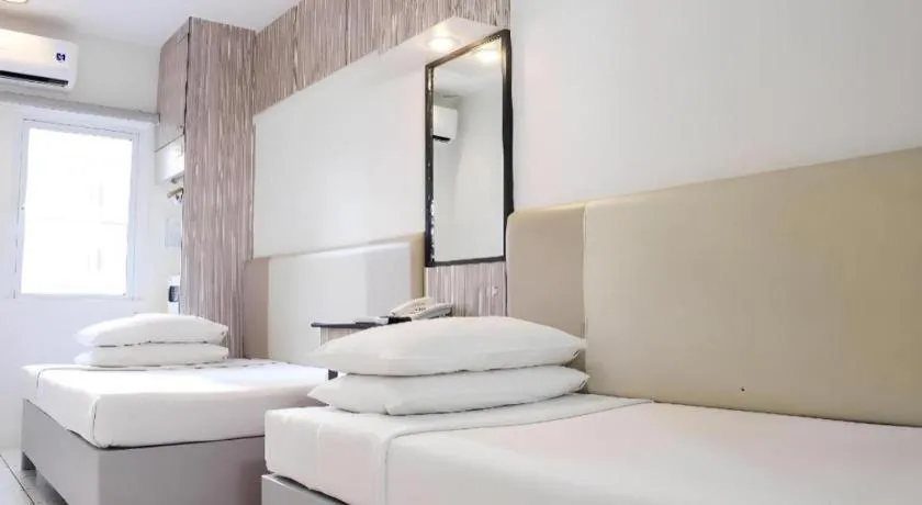 Bed in Majestic Hotel Manila - Formerly Octagon Mansion Hotel Manila