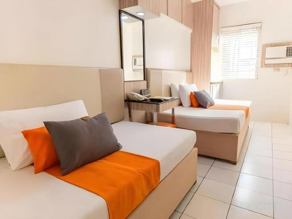 Bed in Majestic Hotel Manila - Formerly Octagon Mansion Hotel Manila