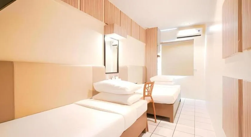 Bed in Majestic Hotel Manila - Formerly Octagon Mansion Hotel Manila