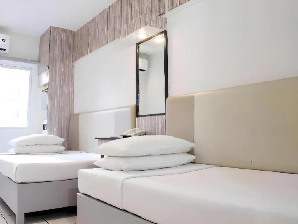 Bed in Majestic Hotel Manila - Formerly Octagon Mansion Hotel Manila