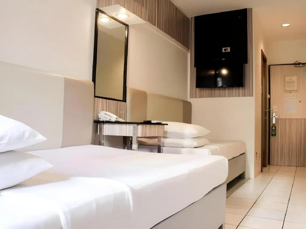 Bed in Majestic Hotel Manila - Formerly Octagon Mansion Hotel Manila