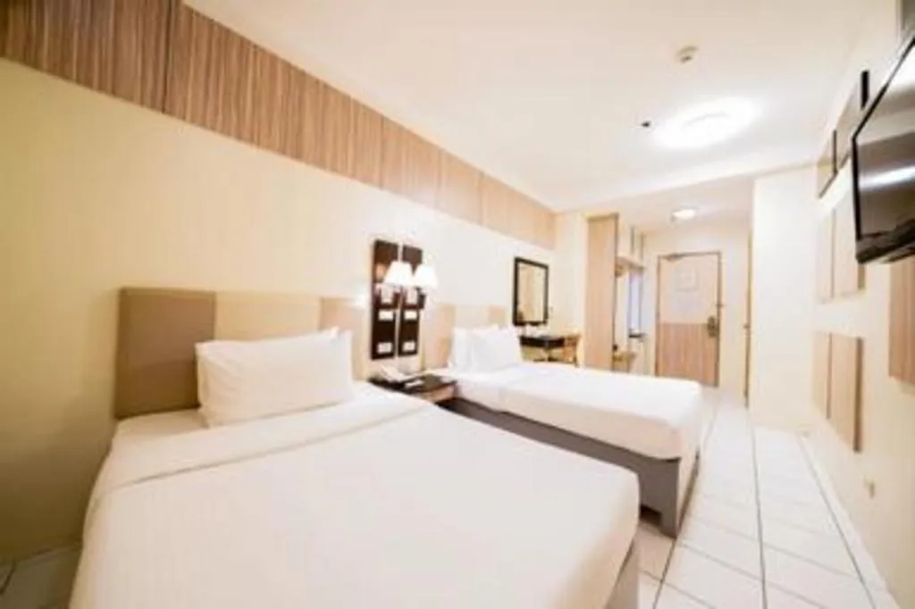 Bed in Majestic Hotel Manila - Formerly Octagon Mansion Hotel Manila