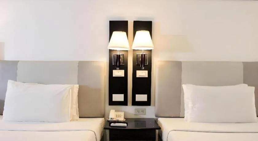 Bed in Majestic Hotel Manila - Formerly Octagon Mansion Hotel Manila