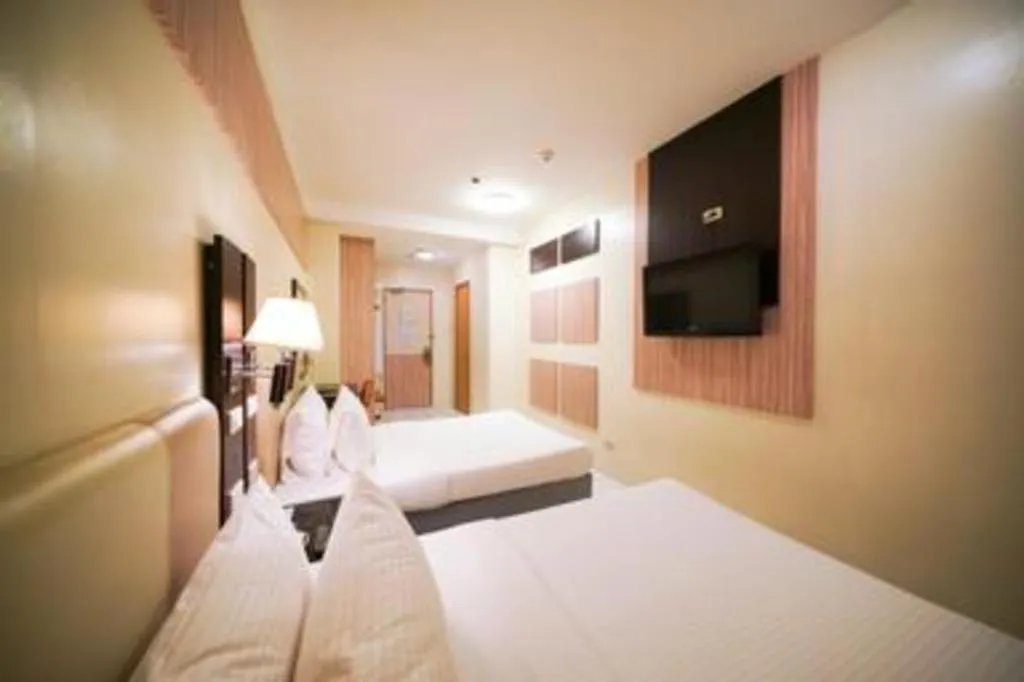 Bed in Majestic Hotel Manila - Formerly Octagon Mansion Hotel Manila