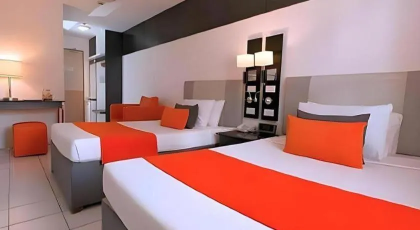 Bed in Majestic Hotel Manila - Formerly Octagon Mansion Hotel Manila