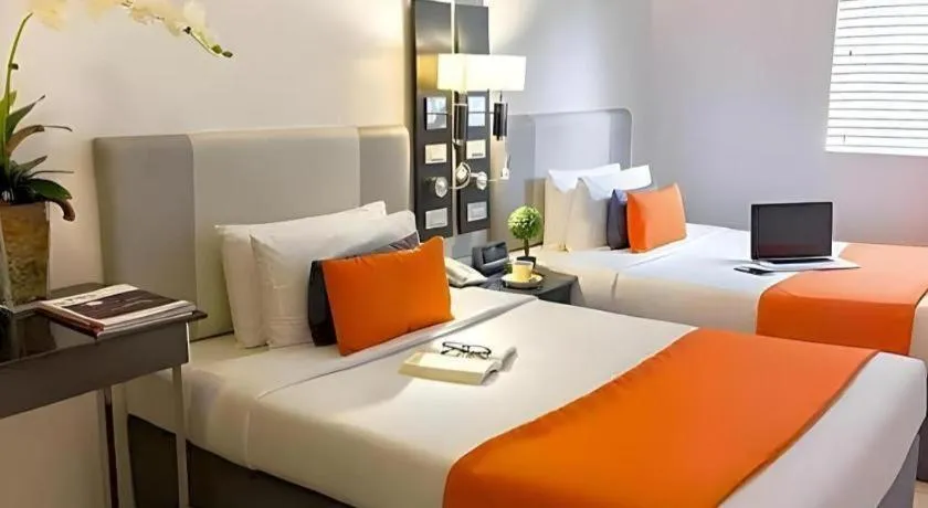 Bed in Majestic Hotel Manila - Formerly Octagon Mansion Hotel Manila