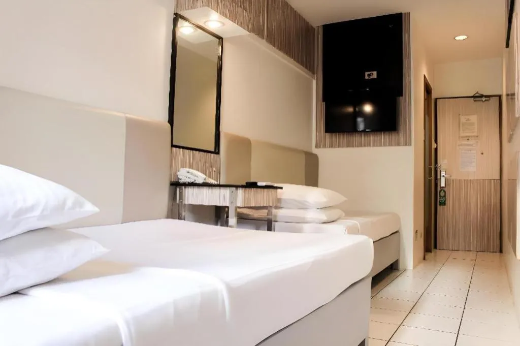 Bed in Majestic Hotel Manila - Formerly Octagon Mansion Hotel Manila