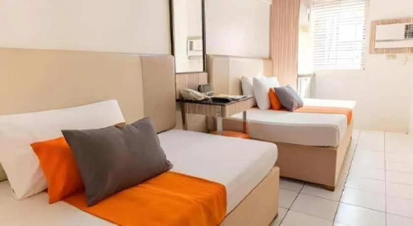 Bed in Majestic Hotel Manila - Formerly Octagon Mansion Hotel Manila