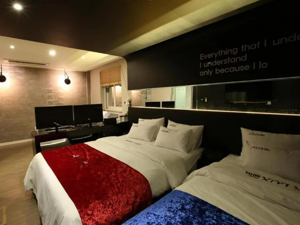 Bed in Jeju Lux Hotel