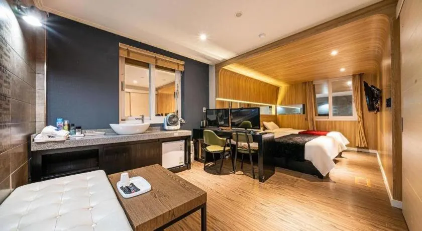 Bed in Jeju Lux Hotel