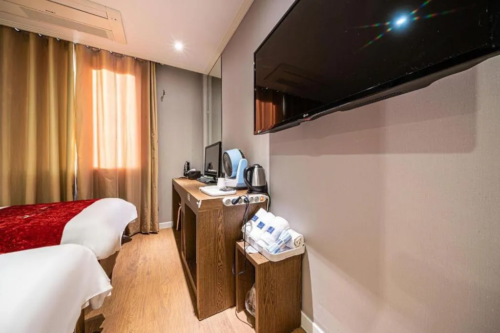 Bed in Jeju Lux Hotel