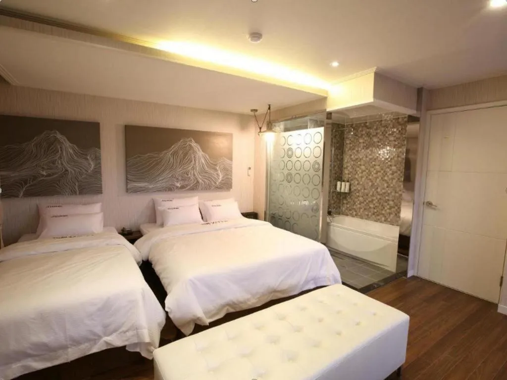 Bed in Jeju Lux Hotel