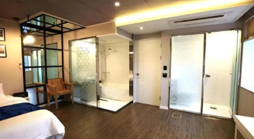 Bed in Jeju Lux Hotel