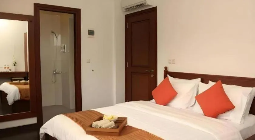 Bed in Hotel Amira Pasteur