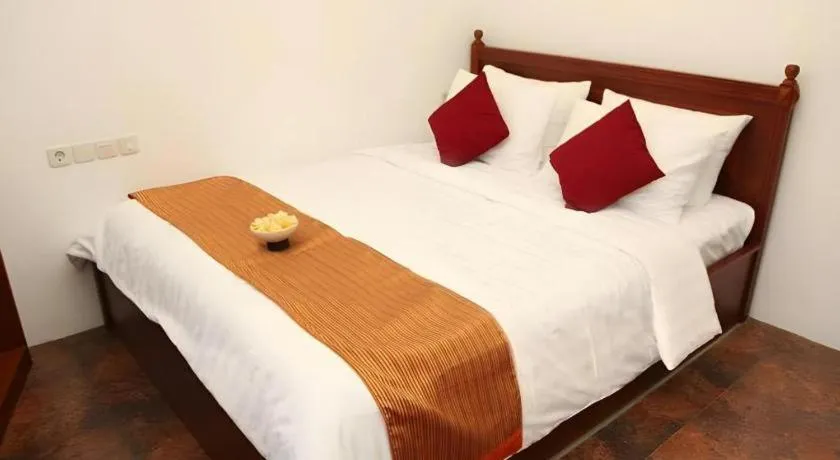 Bed in Hotel Amira Pasteur