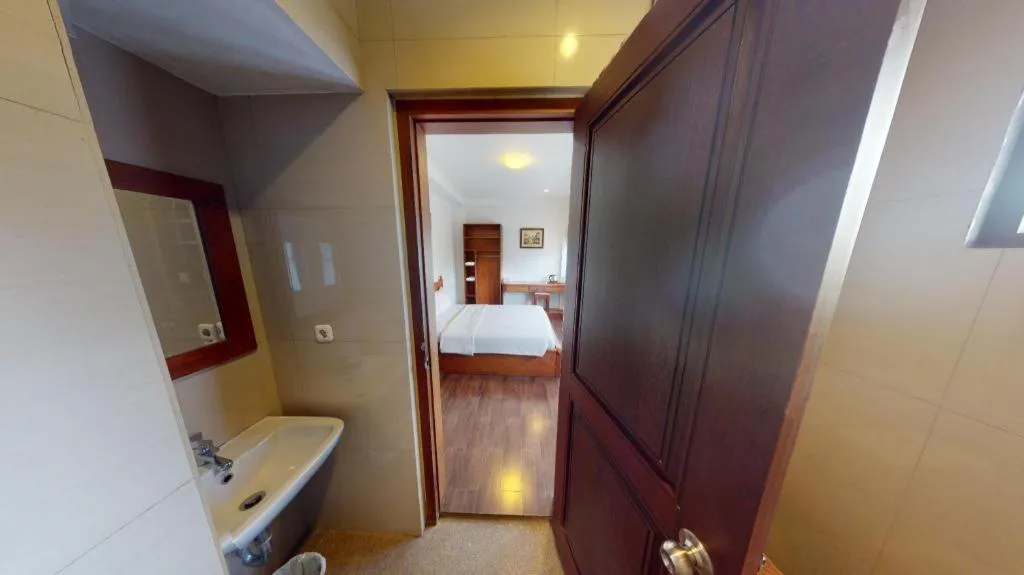 Bed in Hotel Amira Pasteur