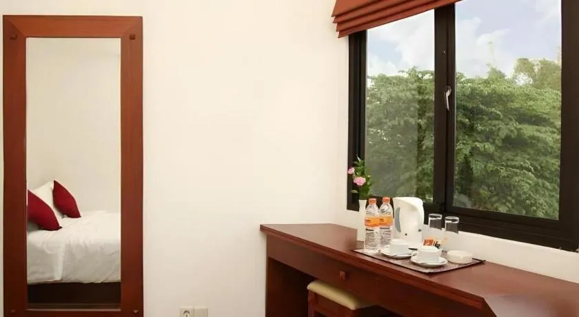 Bed in Hotel Amira Pasteur