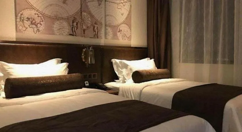 Bed in James Joyce Coffetel Xi'an Lingtong The Terracotta Army Huaqingchi University Town Metro Station