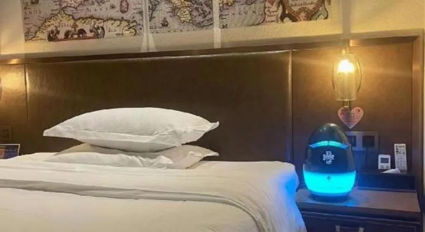 Bed in James Joyce Coffetel Xi'an Lingtong The Terracotta Army Huaqingchi University Town Metro Station