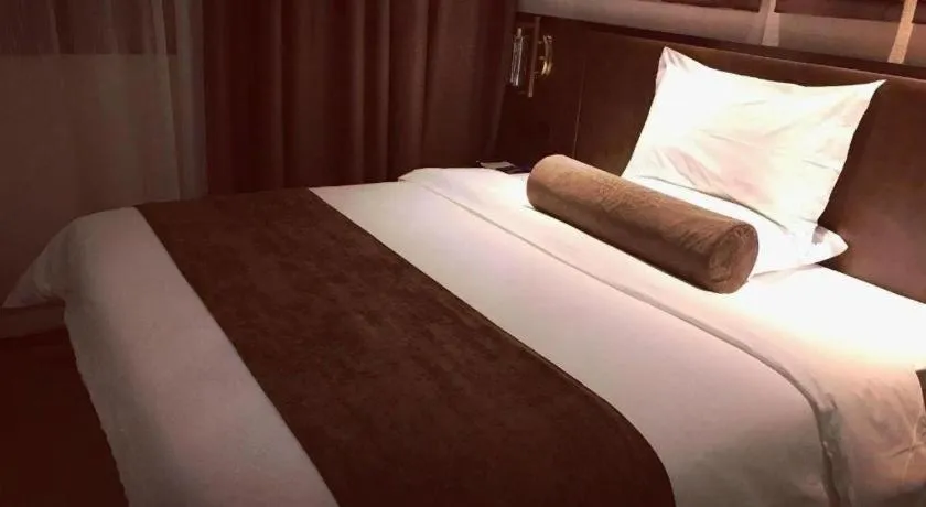 Bed in James Joyce Coffetel Xi'an Lingtong The Terracotta Army Huaqingchi University Town Metro Station