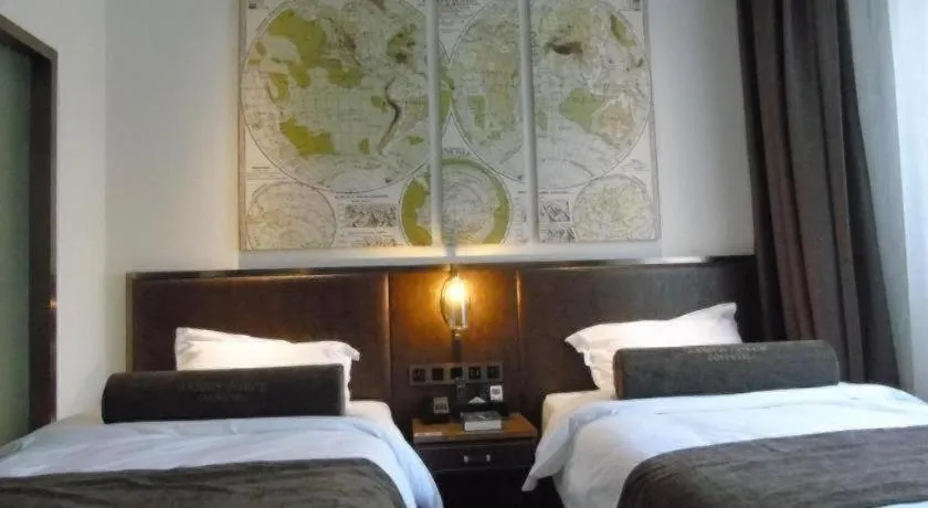 Bed in James Joyce Coffetel Xi'an Lingtong The Terracotta Army Huaqingchi University Town Metro Station