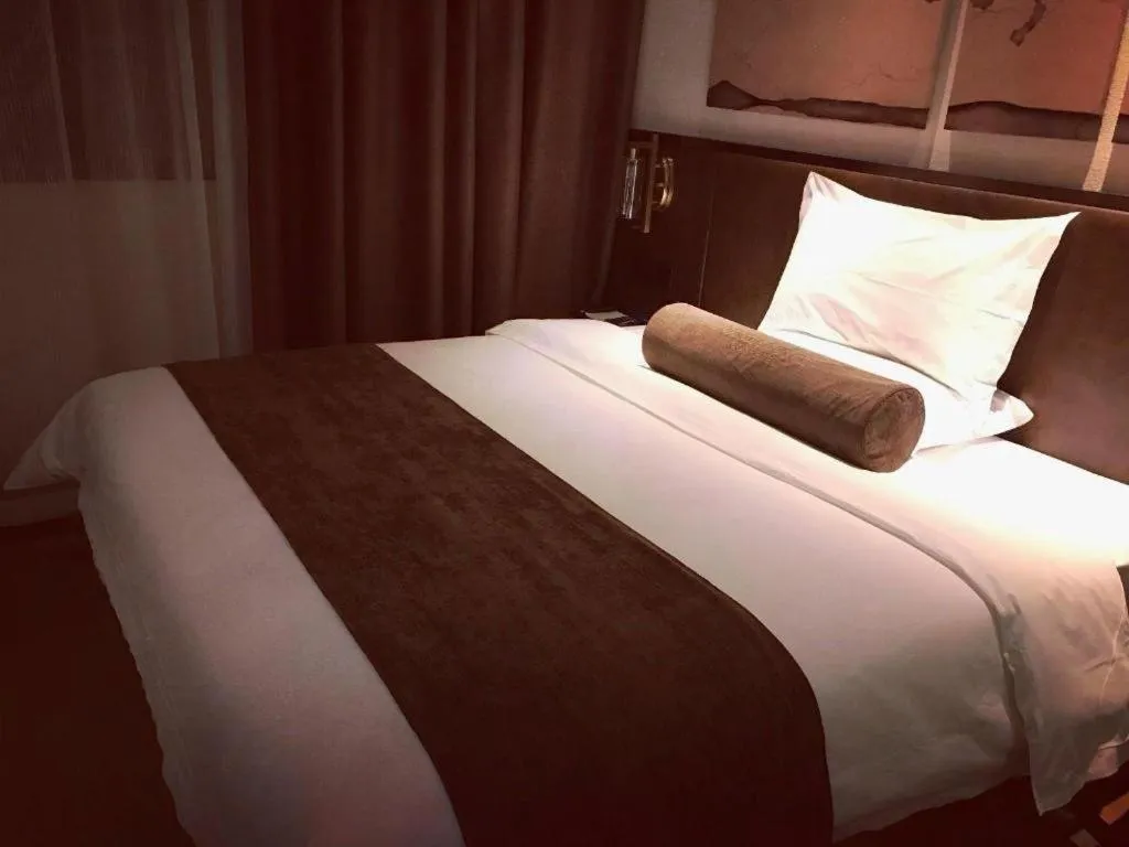 Bed in James Joyce Coffetel Xi'an Lingtong The Terracotta Army Huaqingchi University Town Metro Station