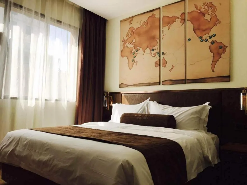 Bed in James Joyce Coffetel Xi'an Lingtong The Terracotta Army Huaqingchi University Town Metro Station