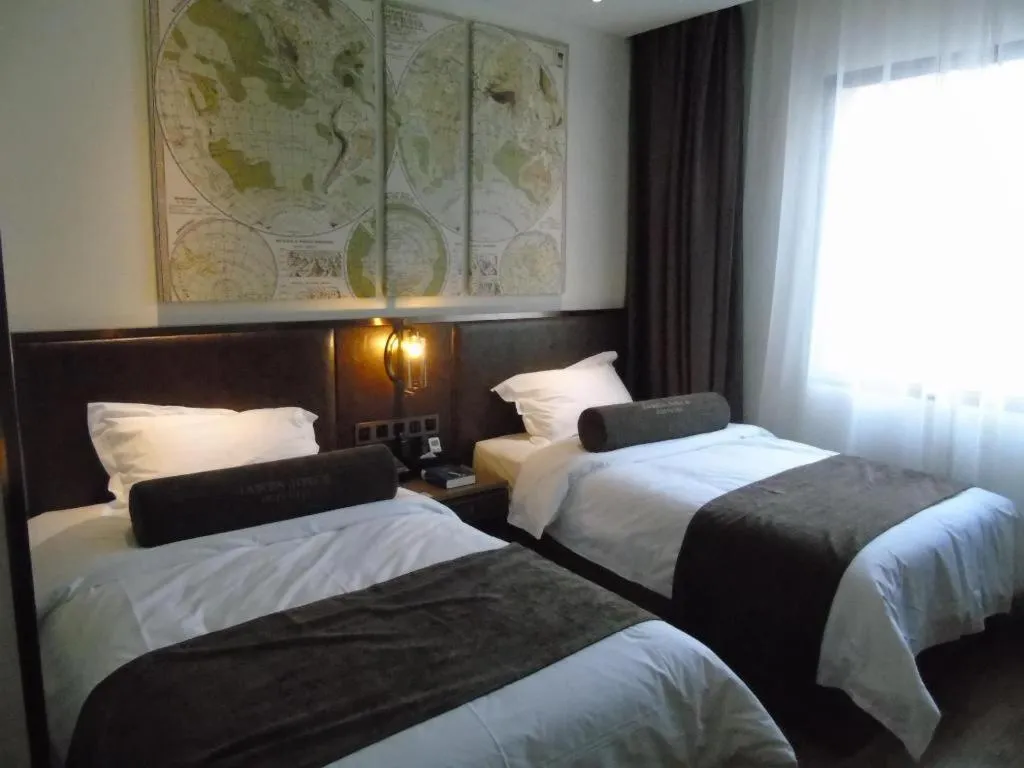 Bed in James Joyce Coffetel Xi'an Lingtong The Terracotta Army Huaqingchi University Town Metro Station