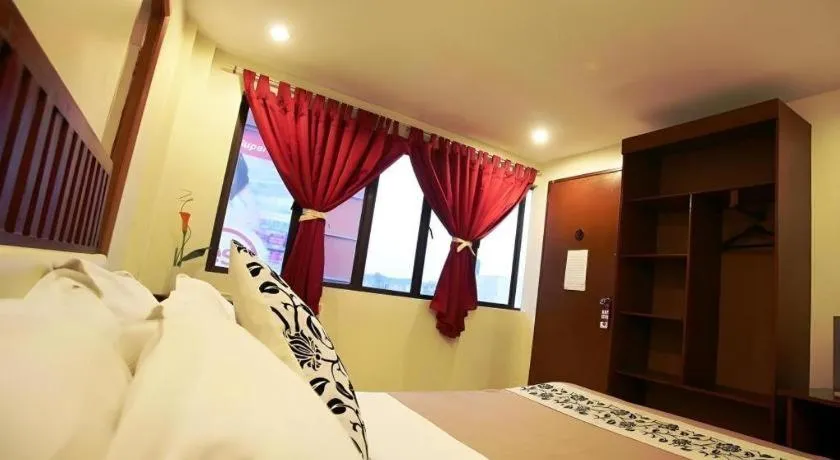 Bed in Naga Land Hotel