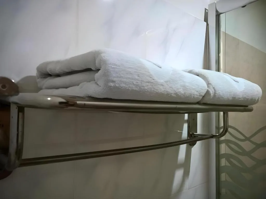 Bed in Naga Land Hotel