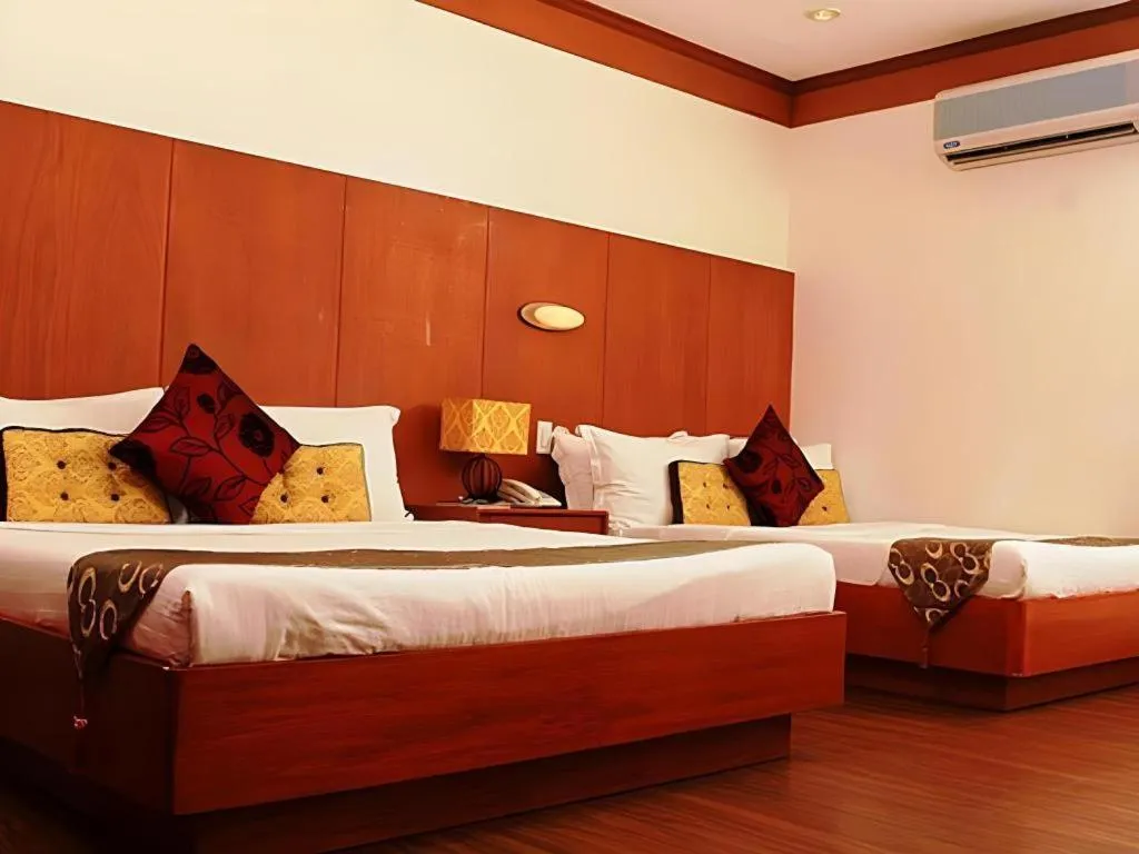 Bed in Naga Land Hotel