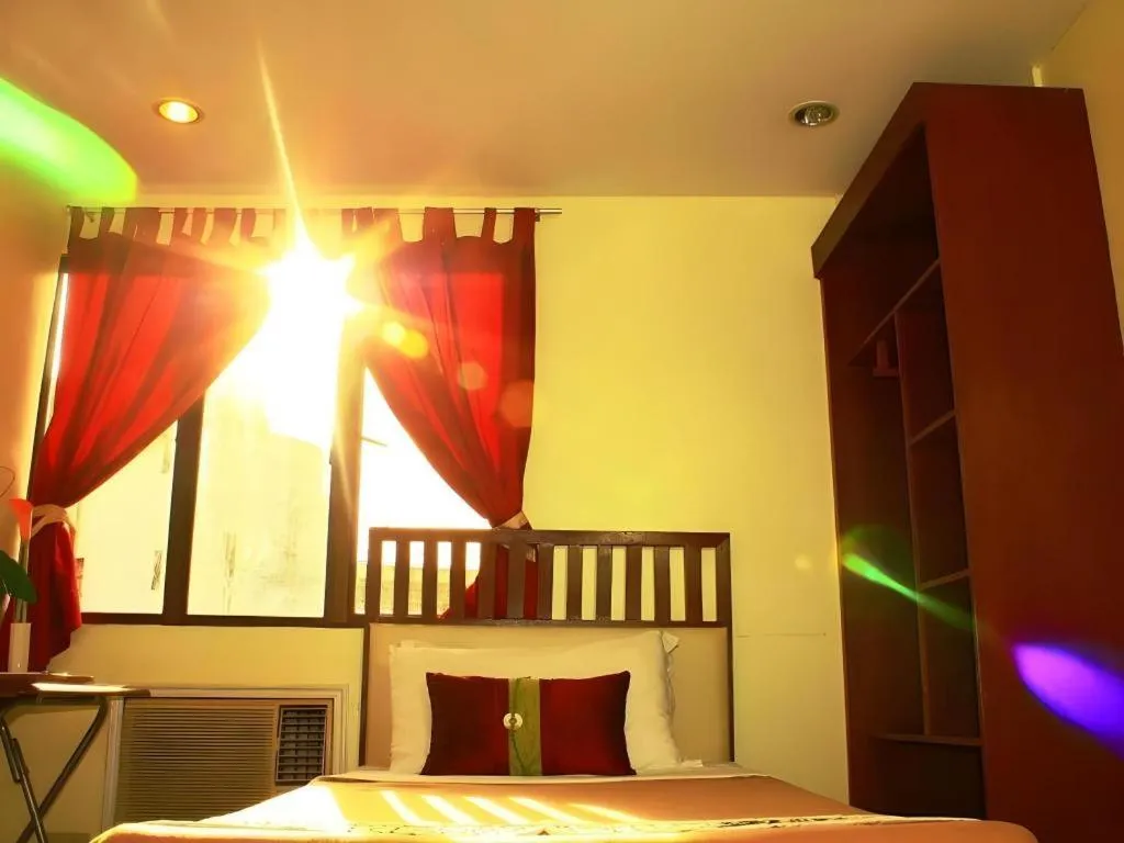 Bed in Naga Land Hotel